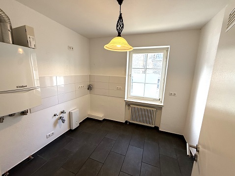 Küche mit modernem Fliesenspiegel