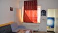 Wohn-/Schlafzimmer EG