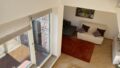 Wohnzimmer mit Balkon